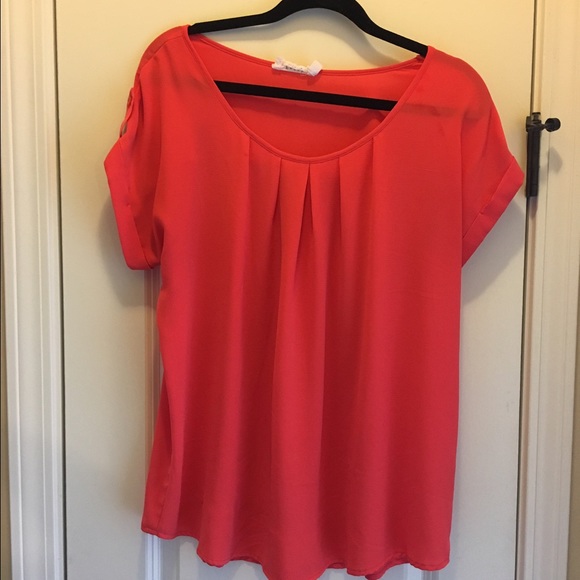 orange boutique top🦊