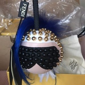 Four, Brand new Fendi Karlito accessories.