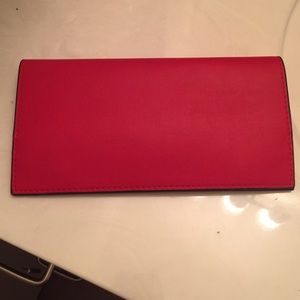 Red Estee Lauder clutch