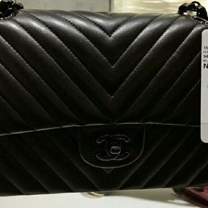 🛍---SOLD---🛍 Black Chevron m/L size Authentic.