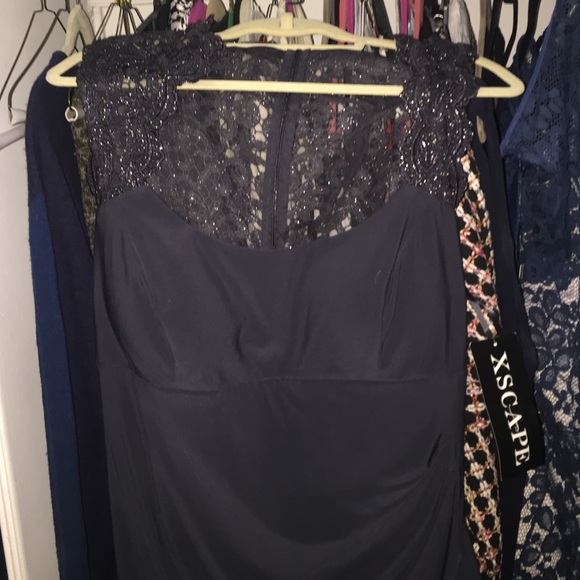 Size 16 never worn charcoal cocktail dress.