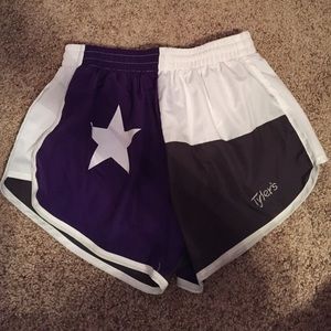 Tyler's purple Texas flag shorts