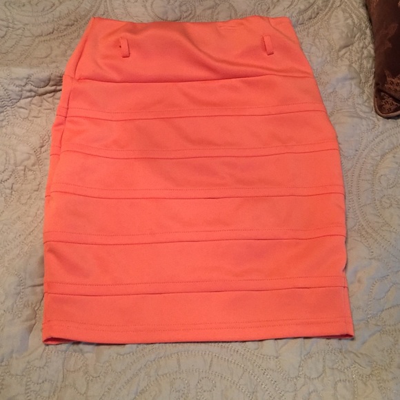 Orange pencil skirt.