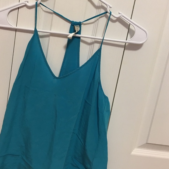 White, purple, and teal tank top