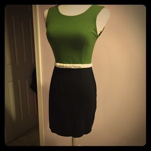 Black and green dress with bow around waist