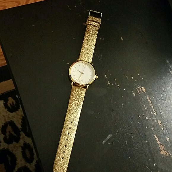 Very pretty gold watch with glitter