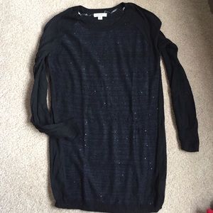 Sparkley black maternity sweater.