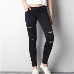 Black mid rise ripped jeans