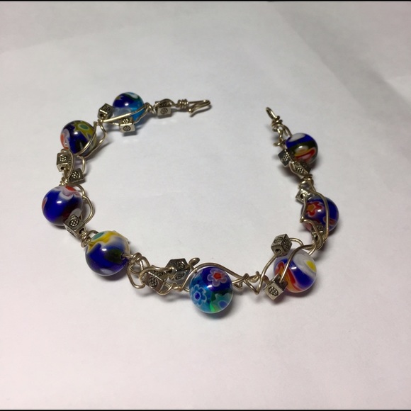 Handcrafted silver wire bracelet with round beads