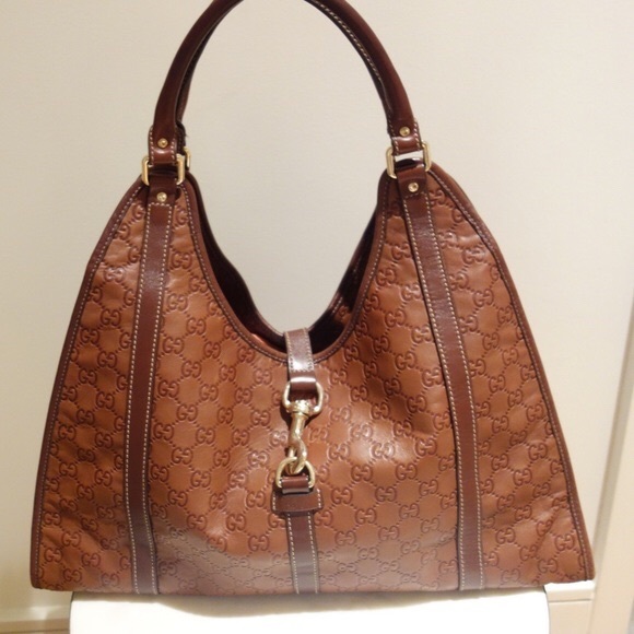 Gucci Monogrammed Leather Bag