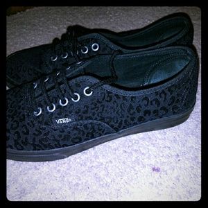 Black cheetah print vans off the wall
