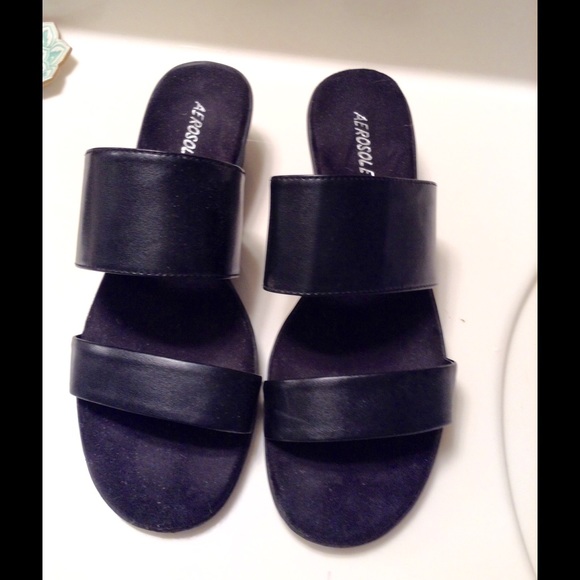 Modern black slides by Aerosoles