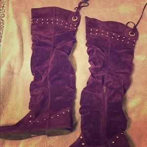 Purple suede flat soled boots