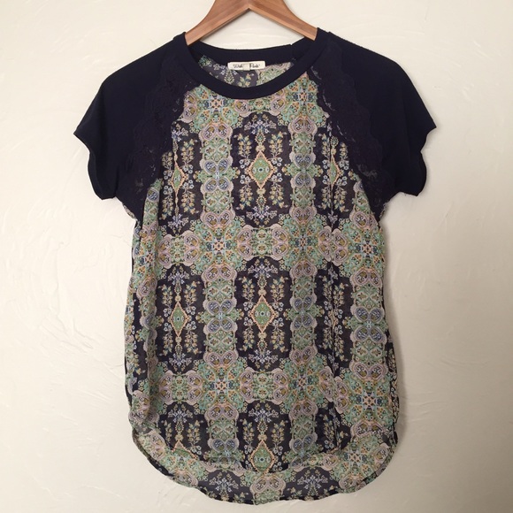 Cute, navy and sheer patterned top!