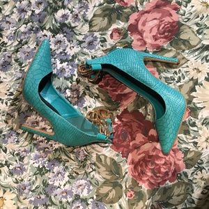 Snakeskin pumps