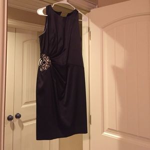 Only wore one time. Black sleeveless dress.