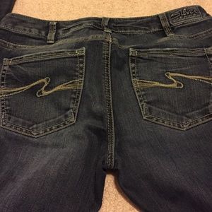 Woman's silver jeans.