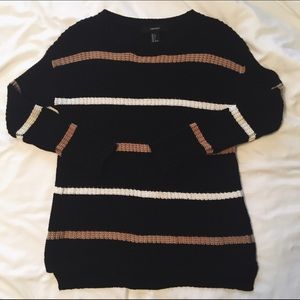 black sweater with tan and white stripes