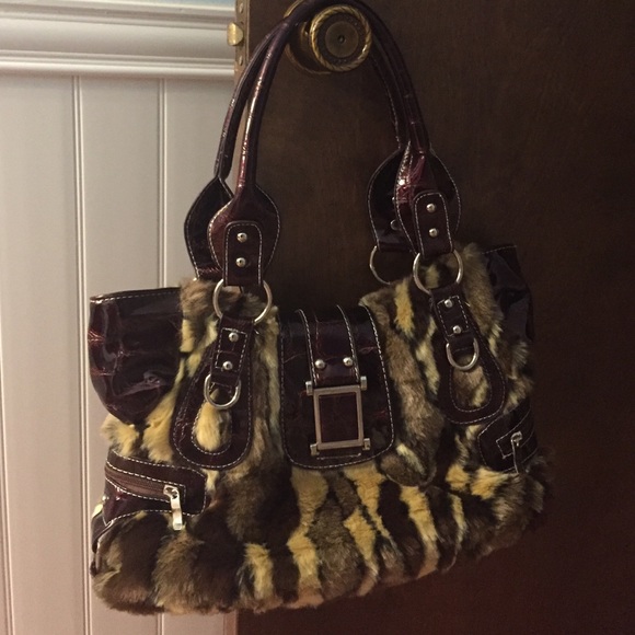 NWOT cheetah fur purse