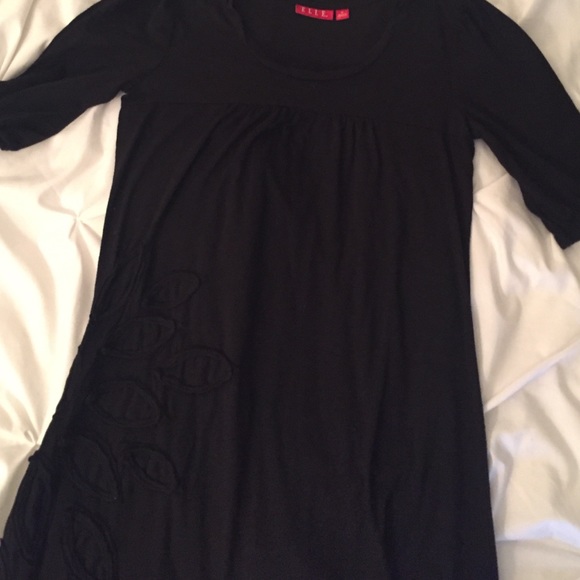 Black mid sleeve dress, flower detail on side