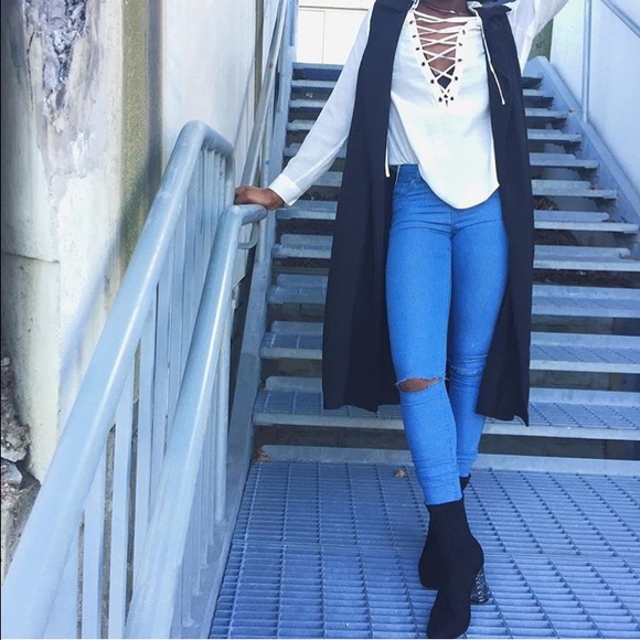 Long black sleeveless duster