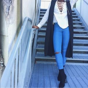 Long black sleeveless duster