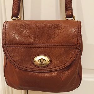Used brown leather Fossil cross-body purse