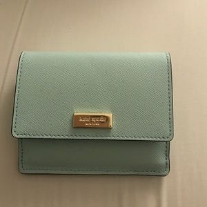 Brand New Kate Spade Petty wallet in graceblue.