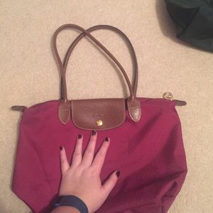 Maroon longchamp purse
