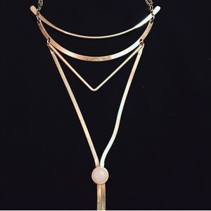 Free People gold bolo necklace.