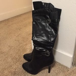 Blacked heeled knee high boot. Sz 8.5