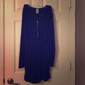 Black long sleeved romper with gold zipper