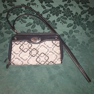 A new wallet with a removable strap