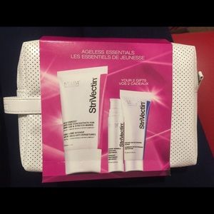 3 piece Strivectin cream with strivectin bag