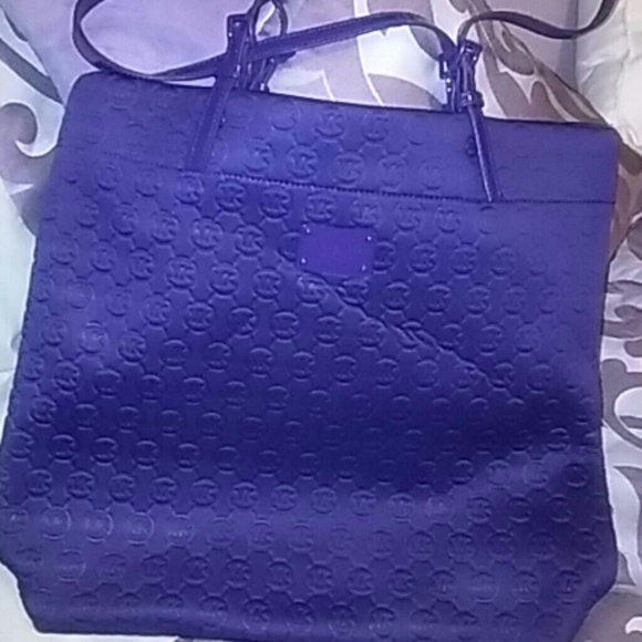 Purple Michael Kors purse