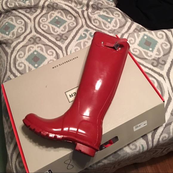 Red tall hunter rain boots