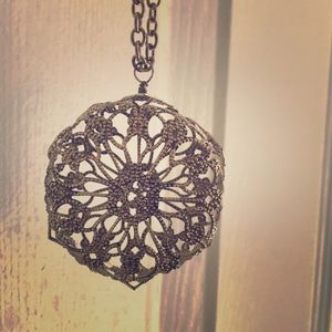 Gold medallion necklace