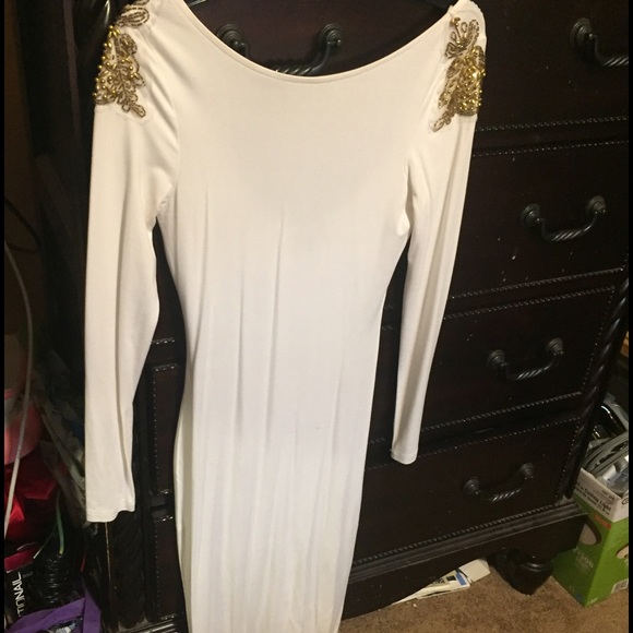White dress with gold sequin on shoulders