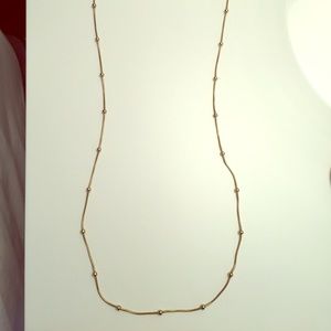 Gold-toned long necklace