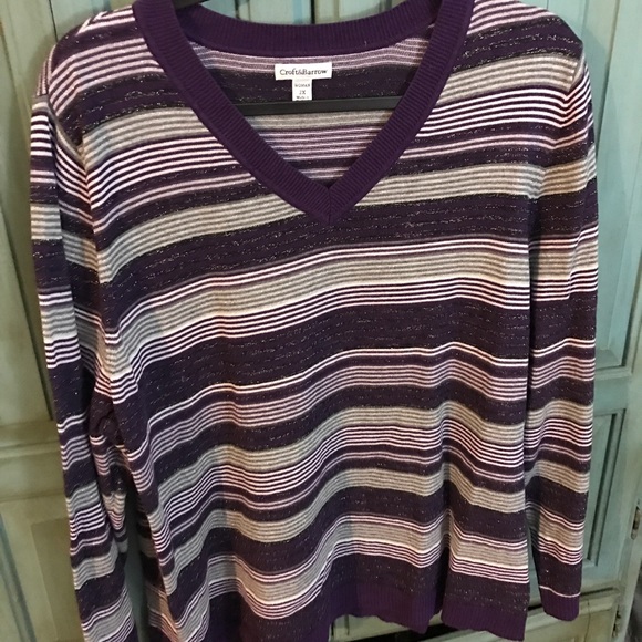 V-neck sweater with silver threading.