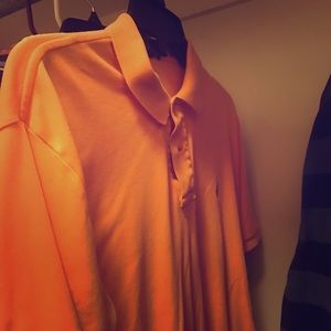 Orange polo polo with light blue horse