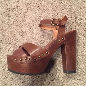 Wooden platform sandals by Mia