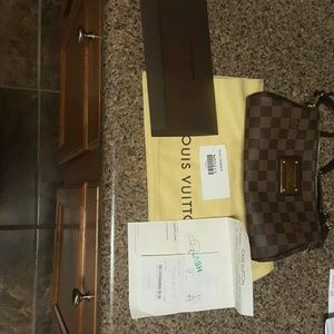Authentic Louis Vuitton Eva clutch