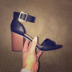 Sandal with thick heel.