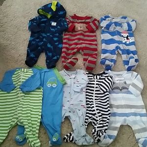 *SOLD* 8 Newborn footie pj's