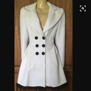 Off white peacoat with black ruffles