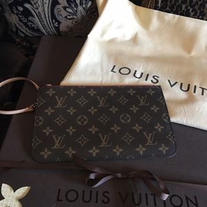 Louis Vuitton clutch. Came with my Neverfull GM!