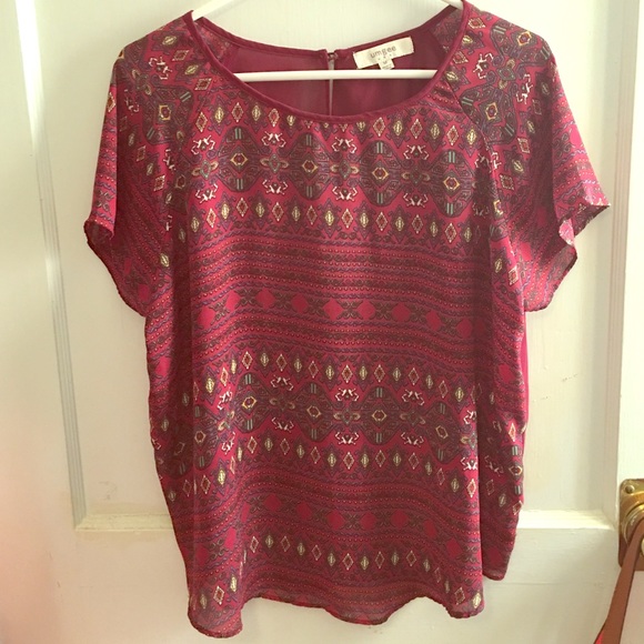 Umgee sheer Aztec top with buttons on the back.