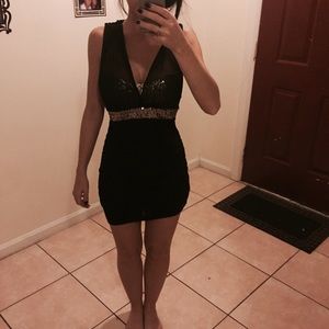Cute black and gold sequin dress. Never worn!