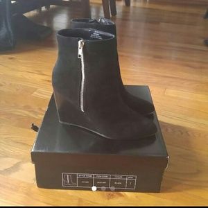 Black wedge booties
